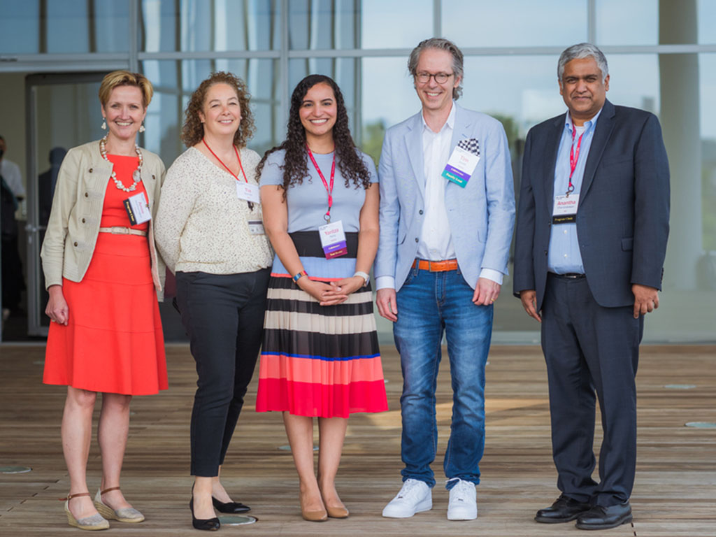 Group photo of 5 members of the MIT-Takeda Program leadership and administration at a program event